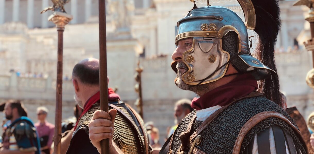 people wearing medieval costumes during day